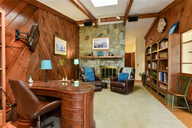 Study / Den with stone fireplace