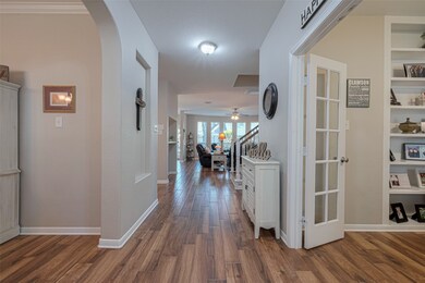 The entryway highlights the home’s neutral palette