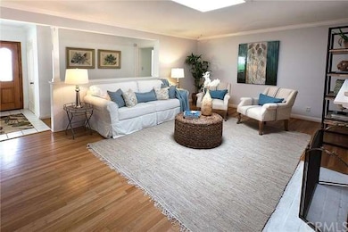 Living Room with skylight and fireplace