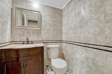 Lovely tiled half bath on main floor.