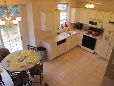 Kitchen. Kitchen features ceramic flooring and cou