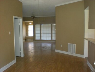 View from dining area into living room. To the lef