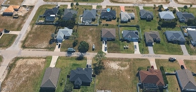 View of property location with nearby suburban area