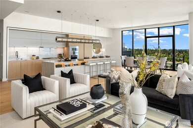 The space invites effortless entertaining with multiple seating areas and access to a private view terrace.