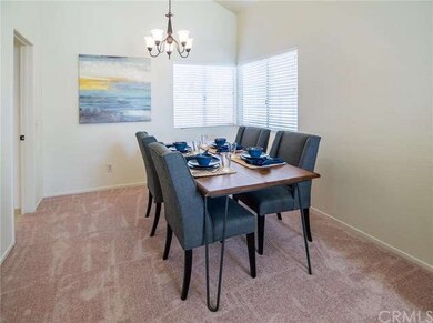 Formal dining room adjacent to the  kitchen with v