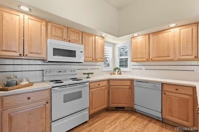 Kitchen offers excellent flow, built-in microwave and pull outs in the cabinets for easy access to kitchen items.