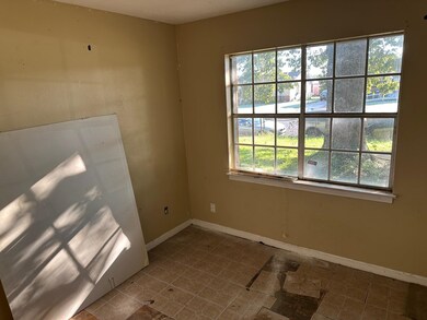 Spare room with a healthy amount of sunlight