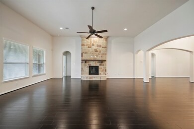 There is a gas fireplace in the living room and recessed lighting throughout the home