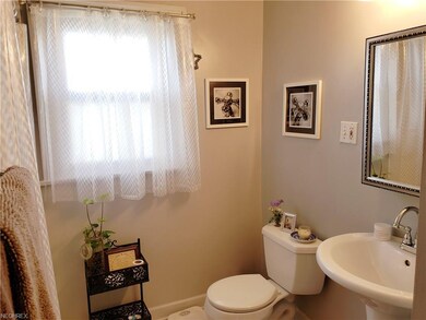 2nd floor full bath has been completely remodeled! Includes subway backsplash in tub/shower and ceramic flooring. Newer mirror is also a medicine cabinet!