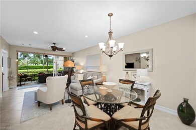 Tiled dining room featuring ceiling fan with notab
