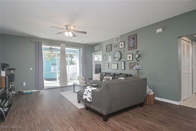 Living room featuring wood-type flooring and ceili