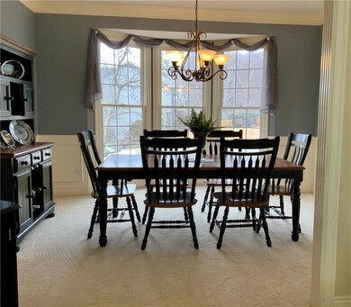 Another view of the dining room with loads of dayl