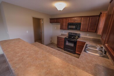 Kitchen view into utility room
