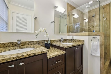 Primary Ensuite With Dual Sinks & A Framless Glass Shower