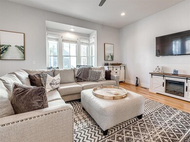 Living room featuring light wood-type flooring and
