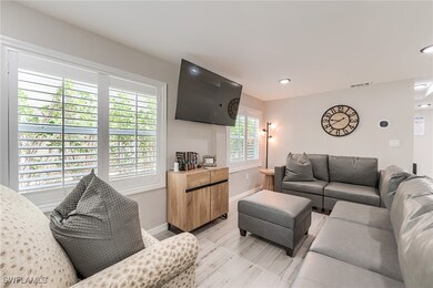 1st Floor Living area featuring baseboards and recessed lighting- Virtually Edited Image