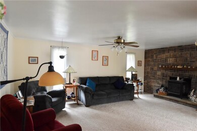 Roomy family room opens from the 3 season patio- e