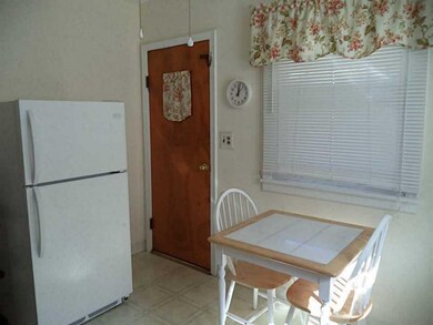 Kitchen. A view of the kitchen leading out to the 
