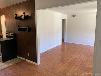 Dining Area next to the kitchen.  Beautiful Hardwo