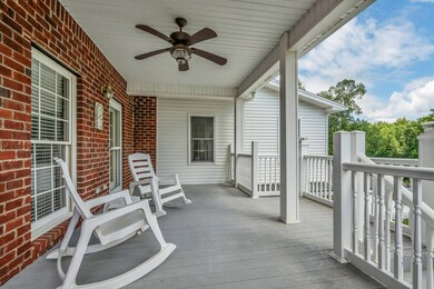 COVERED BACK DECK WITH FANS -- Owner grills with gas grill on this deck!