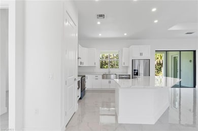 1081 Desoto Blvd S, Naples, FL 34117 - photo 5