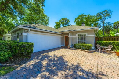 Courtyard Entry Garage & Paver Driveway