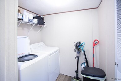 Clothes washing area with crown molding, washing m