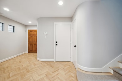 Entry looking towards garage entrance and large st