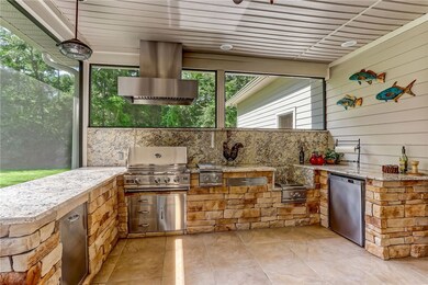 Deluxe summer kitchen with SS appliances, gas gril