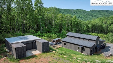 Cargo and garage storage behind house