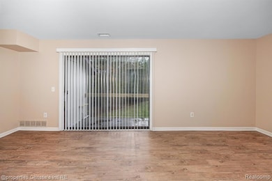 Spare room with light wood finished floors