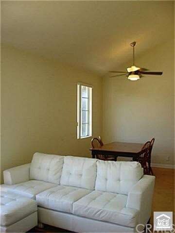 The living room is open to the dinning room to giv