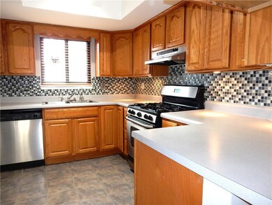 Kitchen featuring appliances with stainless steel 
