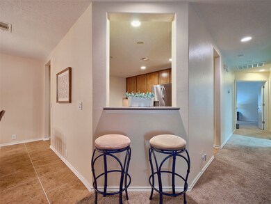 The kitchen is open to the living room.  Great for