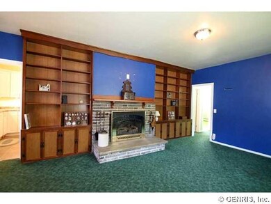 Living Room Built in cherry bookcases and cabinets