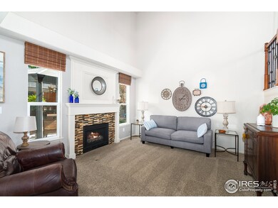 Living room with vaulted ceilings.