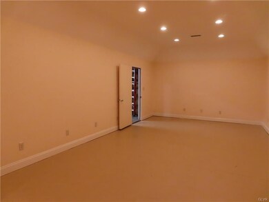 Professional office inside large garage/warehouse.