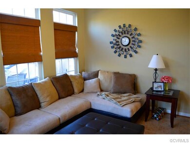 Florida room features tile floor and huge windows 