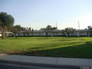 Condo Courtyard w/ Mulberry Trees just trimmed 