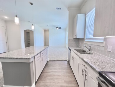 Light modern finishes, under cabinet lighting, and