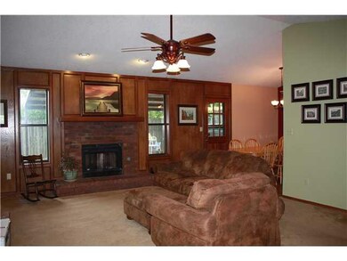 Living Room. Living room with bookcase, wood panel