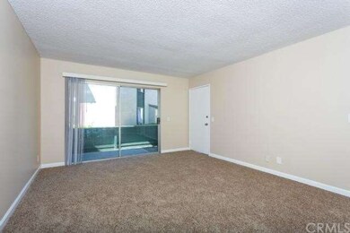 Living Room with Private Patio!