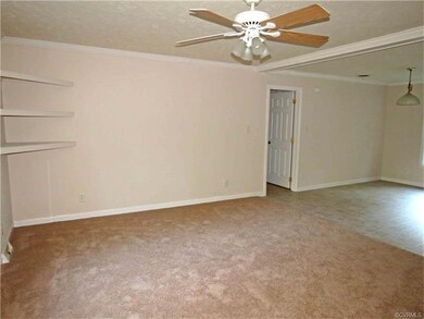 LIVING ROOM OPEN TO DINING AREA