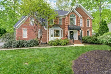 View of front of house featuring a front lawn