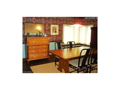 The Formal Dining Room also has natual-finish wood