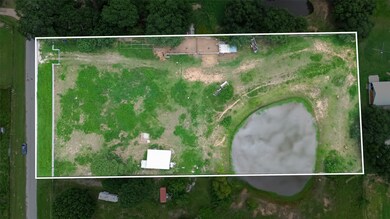 This aerial photo shows a spacious rectangular pro