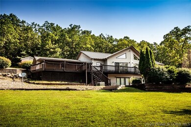 Road side view of the Home.  2 car garage and lots