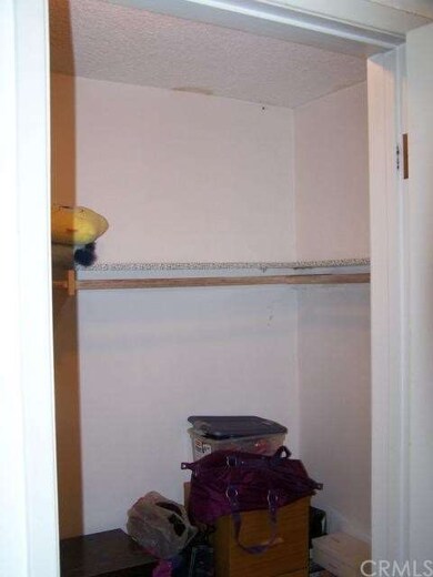 WALK-IN CLOSET INSIDE MASTER BEDROOM