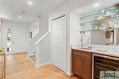 Open Foyer with wet bar area