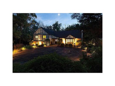 Front Exterior. Extensive outdoor lighting